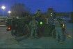 American soldiers preparing for a mission in Afghanistan before dawn