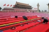  A worker makes last-minute preparations for the National Day parade in Beijing