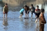 Girl drinking water in Gaza