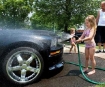 Girl washing car