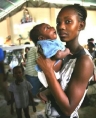 Woman in Haiti with her infant.