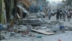 Car crushed by earthquake in Haiti