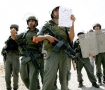 Israeli troops confront demonstrators in Palestine