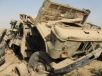 Damage to a truck in Iraq was caused by a landmine or an IED