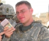 A U.S. Army Lieutenant with the 101st Airborne in Iraq preparing to pay former insurgents for their work with U.S. forces.