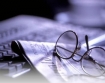 newspaper and glasses