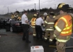 TVF&R Firefighters extricated the driver of the black car and assist in placing the patient on a stretcher to be transported by Metro West Ambulance crews to Legacy Emanuel Hospital.