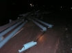 Photo of pipe strewn across the lanes of Highway 22E in Oregon 5-6-08