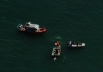 Coast Guard boats aid in search for downed helicopter