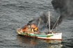 Photos of the Portlock as it burned off the Pacific NW coast of the U.S.