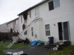 Ladder to window in burned home