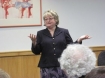 Author Pamela Aiden speaks at a reception in her honor at the Wilsonville Public Library.