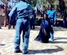 Woman being whipped in Sudan