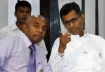 Minister Champika Ranawaka points to someone in the crowd