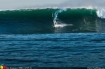 Eric Akiskalian takes on one of the blue swells