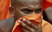 A Buddhist monk protesting in Colombo, 2010. (Andrew Caballero-Reynolds / Courtesy Reuters)