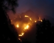 This was a mountain on fire, east of the camp around daybreak. One can see dawn creeping over the horizon. Within minutes, our camp was on fire. Pine trees were exploding like bombs. The place is just outside Shimla. Night of May 27th-28th, 2012, during t