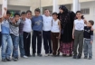 Nahida and a row of boys in Palestine