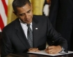 America's corporate president signs the defense bill that he said initially he would veto.