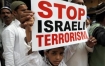 An Indian holds a placard during an anti-Israel demonstration