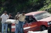 The body of Honduran journalist Luz Marina Paz is taken away from the crime scene.