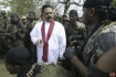 Sri Lanka President Majinda Rajapakse visits troops during the country's civil war in 2009.