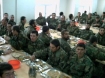 Afghan National Army soldiers take a break and eat a meal in Kabul. 