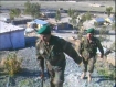 Afghan soldiers climb a hill at Camp Joyce in Afghanistan's Kunar province