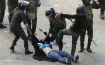 Egyptian security forces beating up woman; these men are who the Morsi supporters allegedly battled