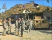 U.S. soldiers standing outside of the TOC at Camp Joyce in Afghanistan.