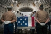 An honor detail comprised of joint military members prepares to escort the remains of fallen servicemembers who died during World War II and the Vietnam War