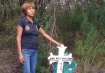 Ernestina Santillan stands on the Mexican side of the Rio Grande, where her son, Juan Pablo, was shot and killed by U.S. Border Patrol agents