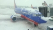 Snow and ice halt hundreds of flights at Chicago Midway Airport on Sunday, Jan. 5, 2014. (Twitter photo/Keith Chard).