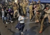 Police in India brutalize people gathered for a protest against a recent gang rape in Delhi.