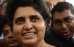 Sri Lanka’s Chief Justice Shirani Bandaranayake (C) walks out of the Supreme Court in Colombo on November 23, 2012 as lawyers see her off as she travels to the national parliament to face impeachment proceedings. -AFP Photo