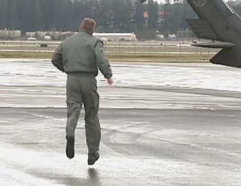 Blackhawk pilot running toward aircraft