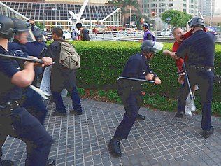 A protester is arrested by Los Angeles Police Department officers after he attempted to join a group of Occupy LA demonstrators. 