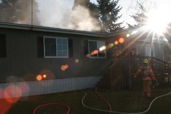 Damage to Canby home and business from 12-22-09 afternoon fire.