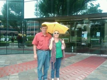 Larry and Laura Jo Hofsess outside of the Burzynski Clinic