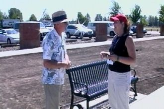 Patty Louisiana talking to another organizer at the Traveling Wall event last summer