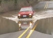 Water can quickly swamp a car and unwary driver crossing deep water Photo By: Tim King