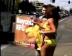 PETA demonstrator in yello bikini