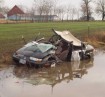 photo: 2002 Saturn ended up partially submerged next to the highway. From Oregon State Police