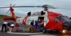 coast guard helicopter and rescued party